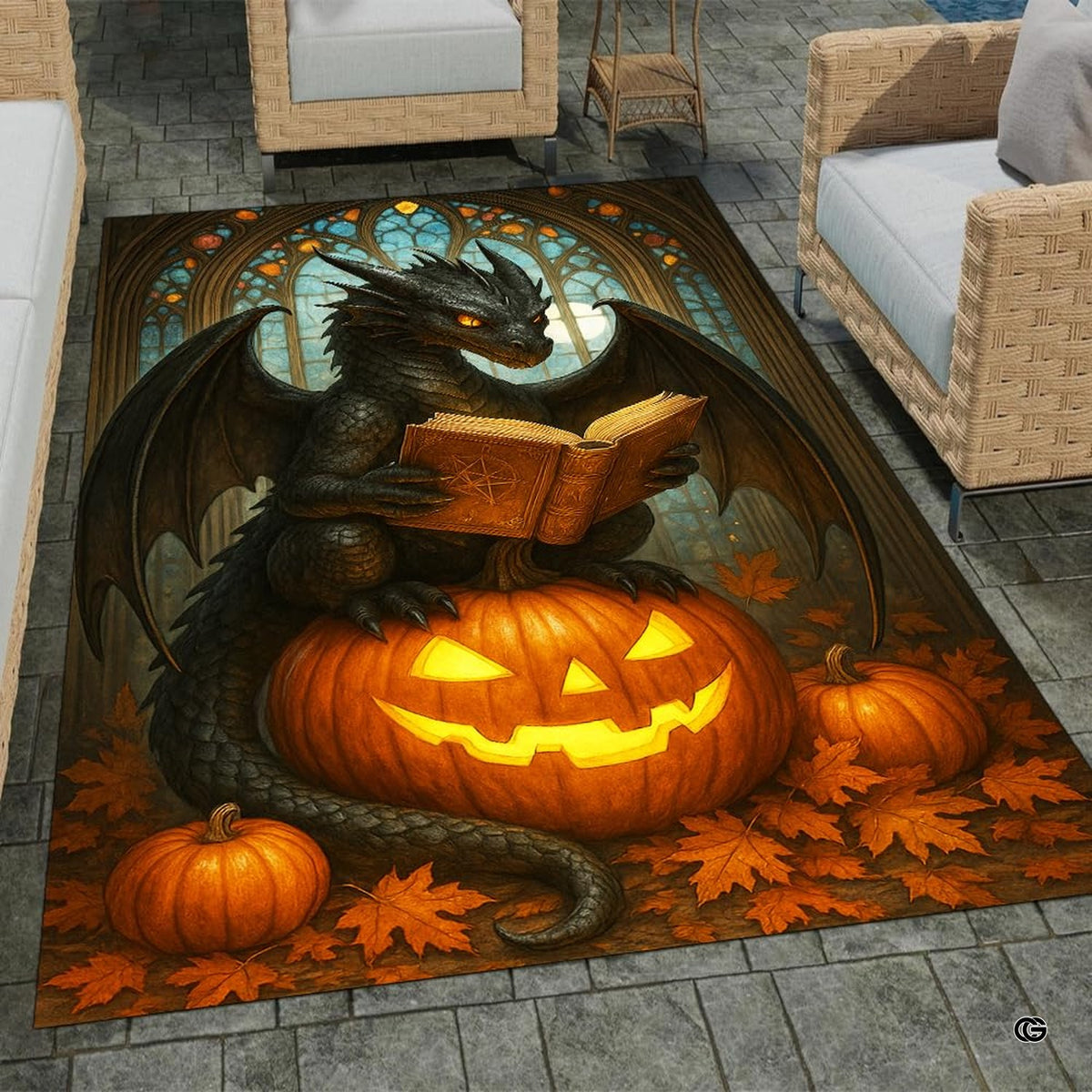 Black winged dragon reading a spellbook while sitting on a carved glowing Halloween pumpkin surrounded by autumn leaves area rug.