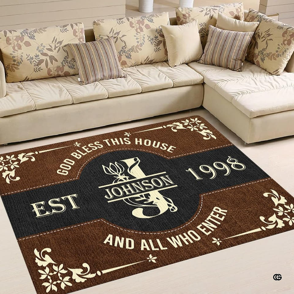 Dark aesthetic family room area rug with filigree flourishes and tailored border accents.