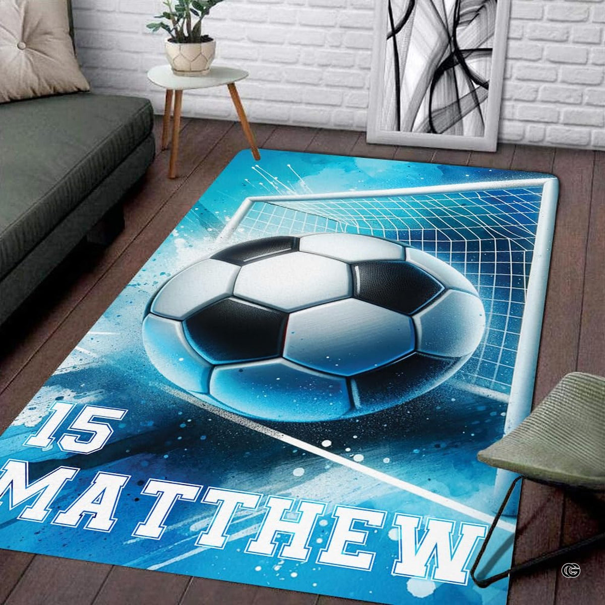 Angled shot of soccer action floor rug exhibiting bright blue hues and abstract sports splatters. - image 7 of 8