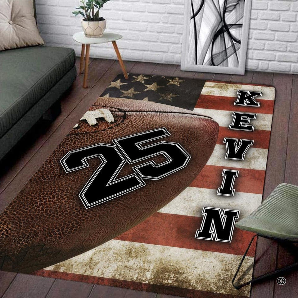 Vintage football and rustic flag design on an area rug in a modern living room setting.