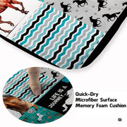 Ranch-style living room decorated with a turquoise and chestnut brown western equestrian patchwork area rug. - thumbnail image 3 of 7