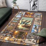 Rustic mallard waterfowl collage area rug displayed across a wooden living room floor.