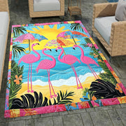 Outdoor patio stone lounge setting displaying the pink flamingo beach area rug - thumbnail image 7 of 8