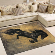 Overhead view of painterly black horse design on a distressed metallic gold rug. - thumbnail image 2 of 5