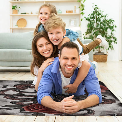 Gothic rose and tentacle art rug styled in a moody modern living room setting. - thumbnail image 4 of 7