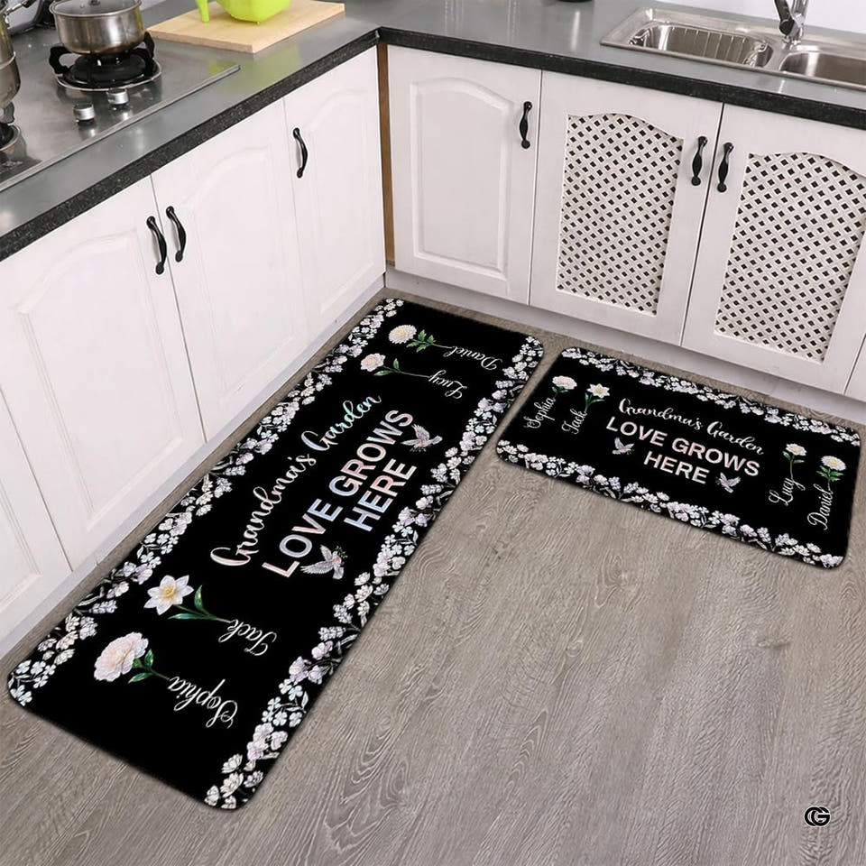 Botanical floral vines bordered cushioned area rug on dark floor setting