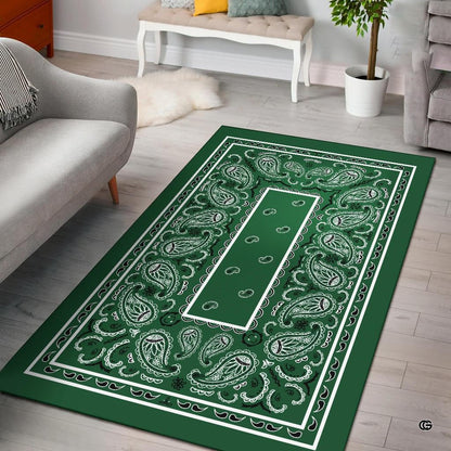 Green bandana rug featuring classic teardrop paisley motifs and ornate borders on forest green background. - thumbnail image 1 of 9