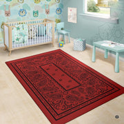Decorative crimson area rug complementing rustic interior accents and wooden coffee table arrangement. - thumbnail image 6 of 9
