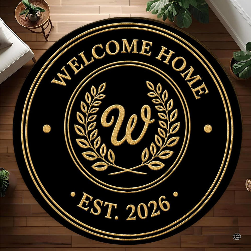 Circular medallion round area rugs 6 ft featuring laurel wreath border and central script crest on dark backdrop