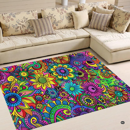 Detailed close-up of intricate blooming flower illustrations and bold black outlines on area rug. - thumbnail image 2 of 5