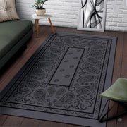 Soft low-pile microfiber fabric and foam cushioning detail of bandana rug - thumbnail image 3 of 9