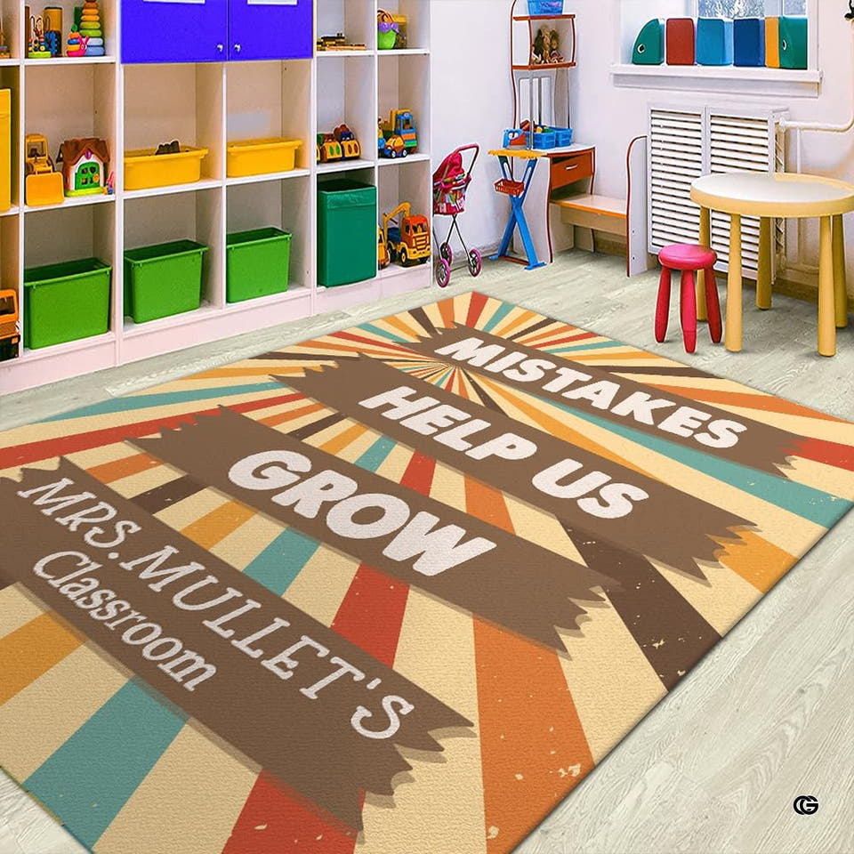 Retro sunburst classroom area rug featuring radiating earth tone beams and wooden plank graphics in a kindergarten room.