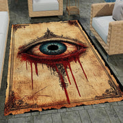 Top down overhead perspective of gothic weeping eye floor accent rug showing centered mystical artwork. - thumbnail image 6 of 7