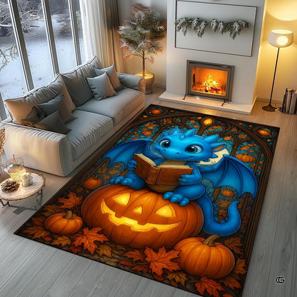 Cute blue baby dragon reading a book seated atop a glowing Halloween pumpkin surrounded by autumn leaves area rug. - thumbnail image 5 of 8