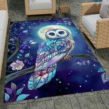 Artistic night owl carpet showcasing a vibrant turquoise owl perched on a branch under a glowing moon.