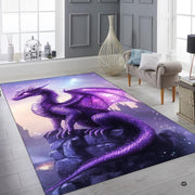 Angled view of shining area rug presenting rich indigo and lavender dragon artwork. - thumbnail image 6 of 7