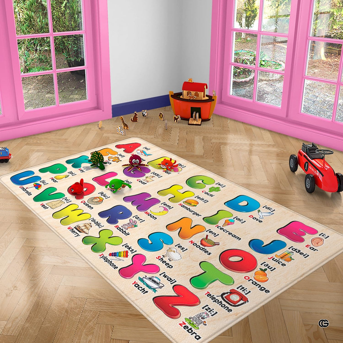 Playroom reading nook decorated with an alphabet chart educational play mat area rug and contemporary kids seating.