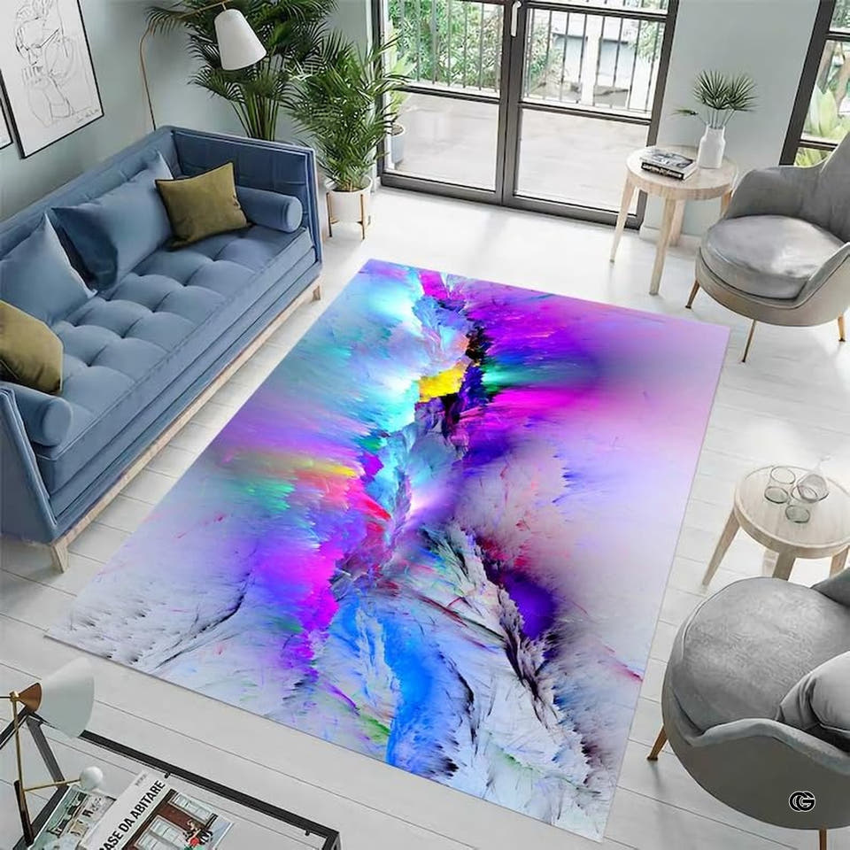 Abstract area rug with vibrant magenta, cyan, and yellow powder burst clouds on off-white ground.