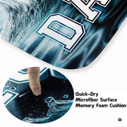 Close visual detail of deep navy ripples, white sea spray, and cyan lightning accents on a sports rug. - thumbnail image 3 of 8
