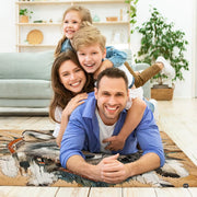 Bright sunroom setting with the rustic wolf warrior rug centered on wooden flooring - thumbnail image 5 of 7