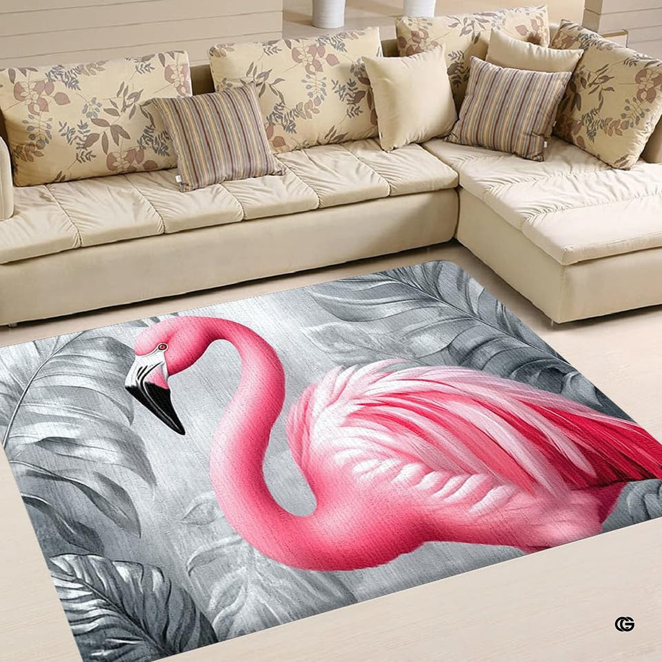 Pink flamingo monochrome palm tropical living room area rug in front of a sofa