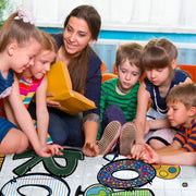 Detailed corner view of scholastic doodle area rug displaying vibrant patchwork motifs. - thumbnail image 6 of 7