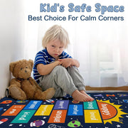 Close-up view of celestial graphics, decorative accent numbered squares, and colorful letters on an educational space rug. - thumbnail image 3 of 9