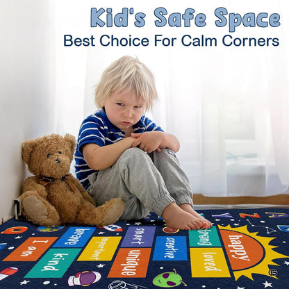 Close-up view of celestial graphics, decorative accent numbered squares, and colorful letters on an educational space rug. - thumbnail image 3 of 9