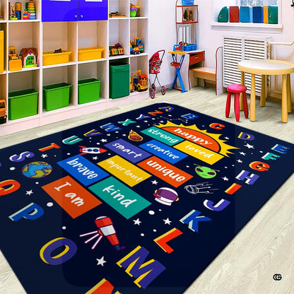 Overhead angle of celestial alphabet decorative accent rug styled in a modern bright playroom with wooden toys. - thumbnail image 5 of 9