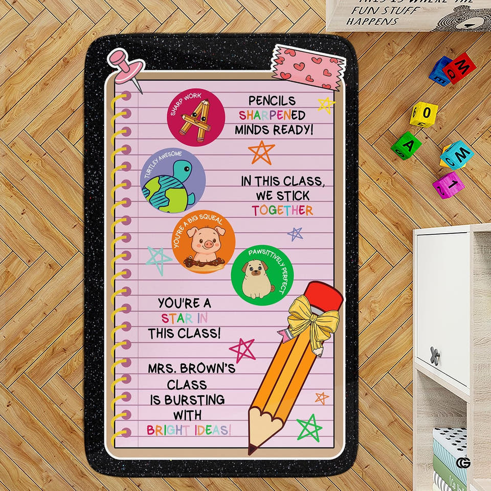 Wood floor playroom with building blocks displaying the notebook clipboard teacher area rug