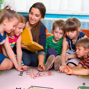 Teacher reading stories with children sitting on the classroom feelings rug - thumbnail image 6 of 7