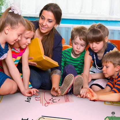 Teacher reading stories with children sitting on the classroom feelings rug - thumbnail image 6 of 7
