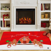 Gingerbread family holiday area rug styled in front of cozy fireplace with holiday slippers - thumbnail image 2 of 9