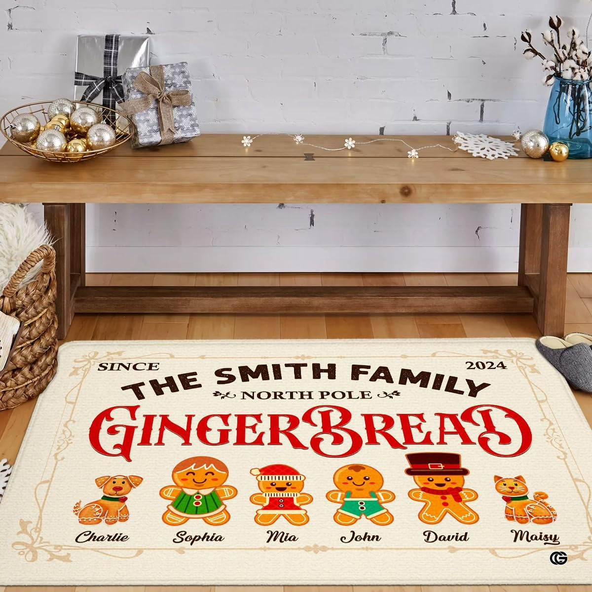 Top-down view of gingerbread figures and pets dressed in seasonal outfits across festive floor covering. - image 2 of 9