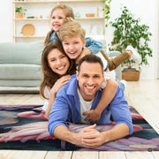 Contemporary living room setting styling the pink flamingo lotus pond area rug by a sofa - thumbnail image 5 of 7