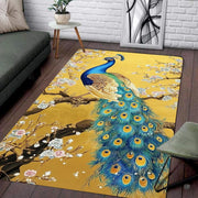 Peacock oriental rug displaying vibrant blue plumage and blossoms on a golden textured backdrop. - thumbnail image 1 of 8