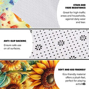 Close-up detail of textured sunflower seed centers and decorative accent cyan background accents on a decorative area rug. - thumbnail image 4 of 8