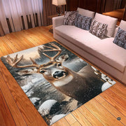 Close-up of buck illustration on wildlife area rug highlighting detailed antlers and frosted evergreens. - thumbnail image 2 of 5