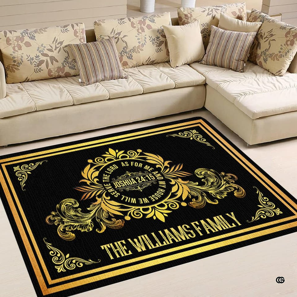 Rectangular black and gold Area Rug featuring ornate baroque scrolls and central crest in living room.