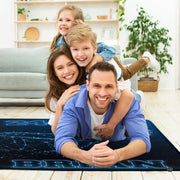 Lifestyle living room scene featuring family lounging on basketball area rug. - thumbnail image 5 of 7