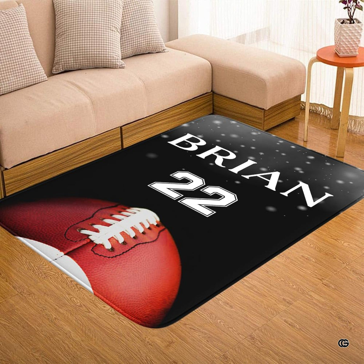 Football graphic area rug anchoring game day decor in a modern home entertainment den alongside sports memorabilia. - image 7 of 7