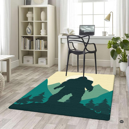 Home office desk setup with swivel chair placed over the teal bigfoot mountain moon area rug - thumbnail image 5 of 5