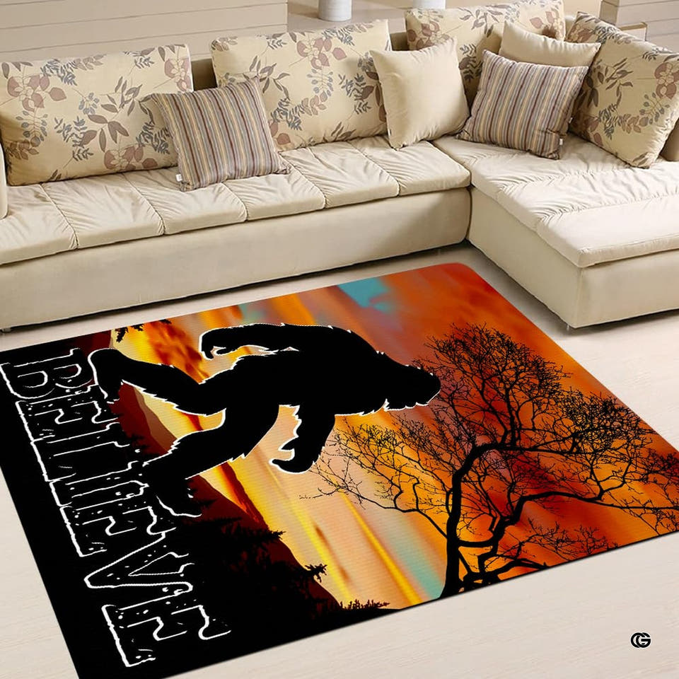 Bigfoot silhouette hunting lodge style rug showing a sunset forest scene.