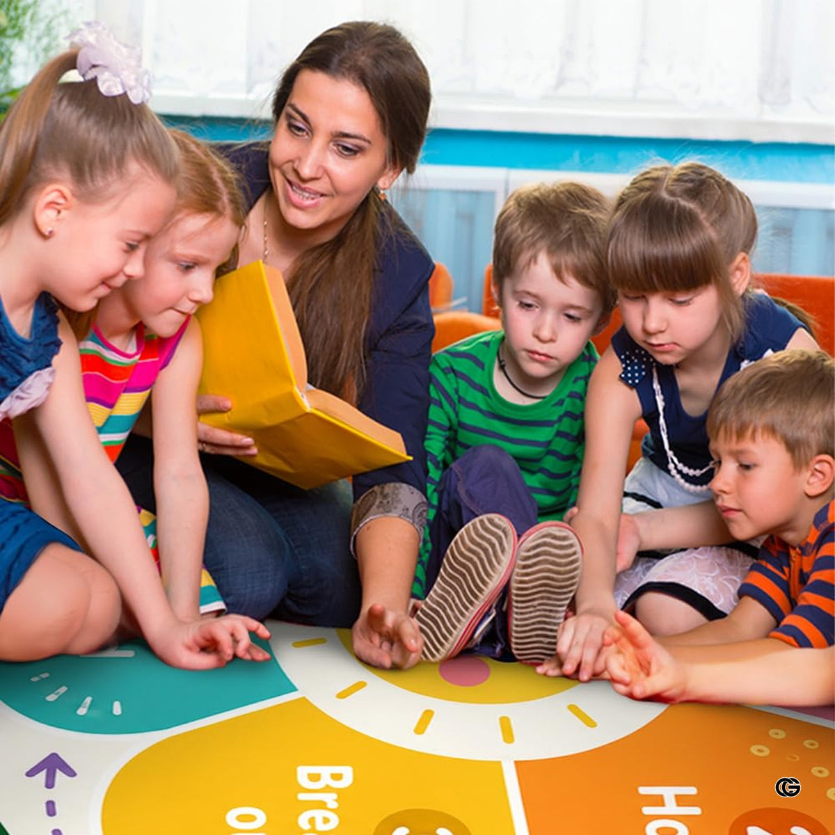Calm down corner ideas featuring a colorful decorative accent decorative accent area rug in a modern classroom setting.