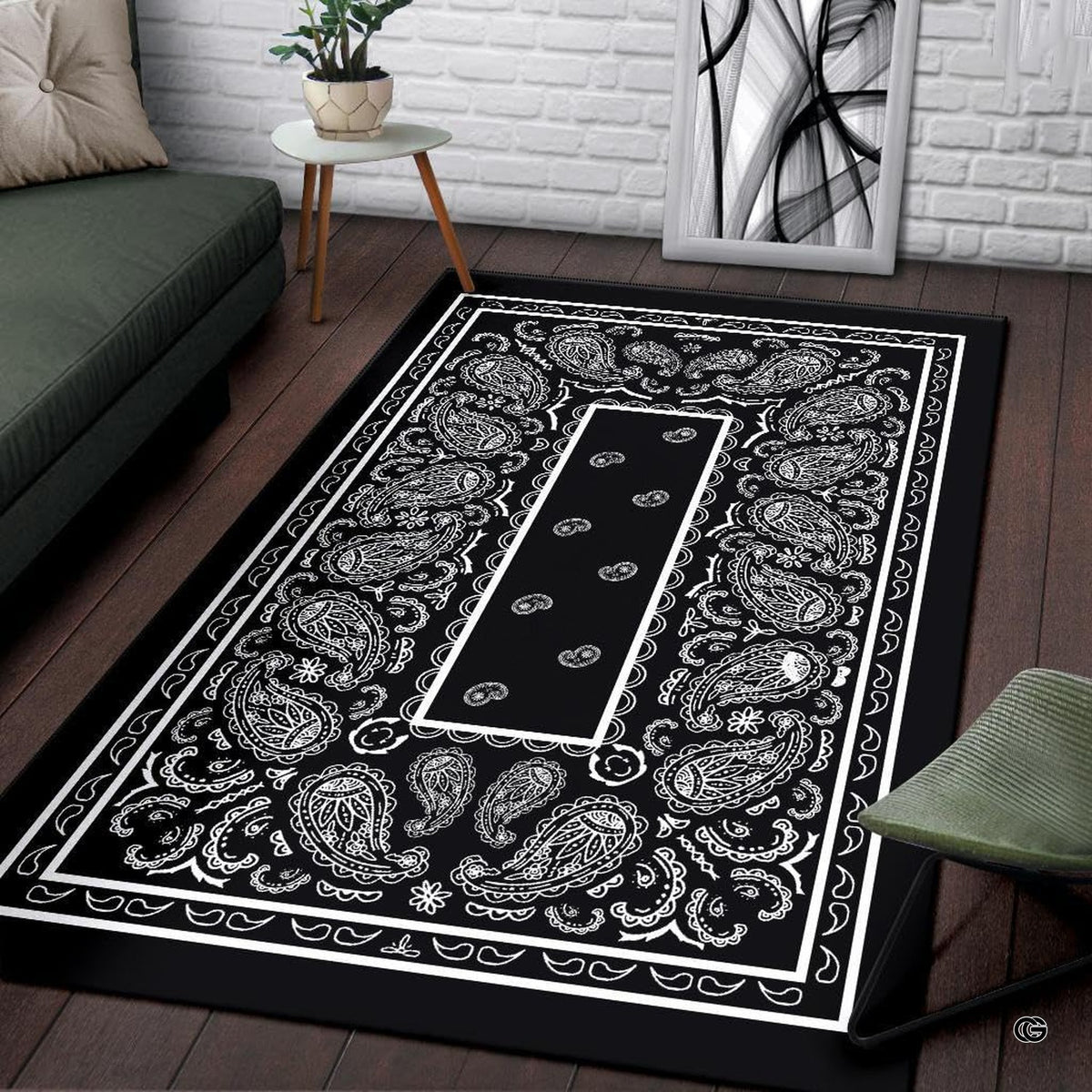 Close-up of high-contrast black and white paisley pattern and geometric linear border.