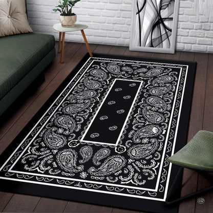 Close-up of high-contrast black and white paisley pattern and geometric linear border. - thumbnail image 3 of 9