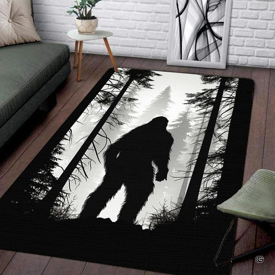 Monochrome Bigfoot Sasquatch silhouette kids play rug large area rug in a styled woodland nursery setting.