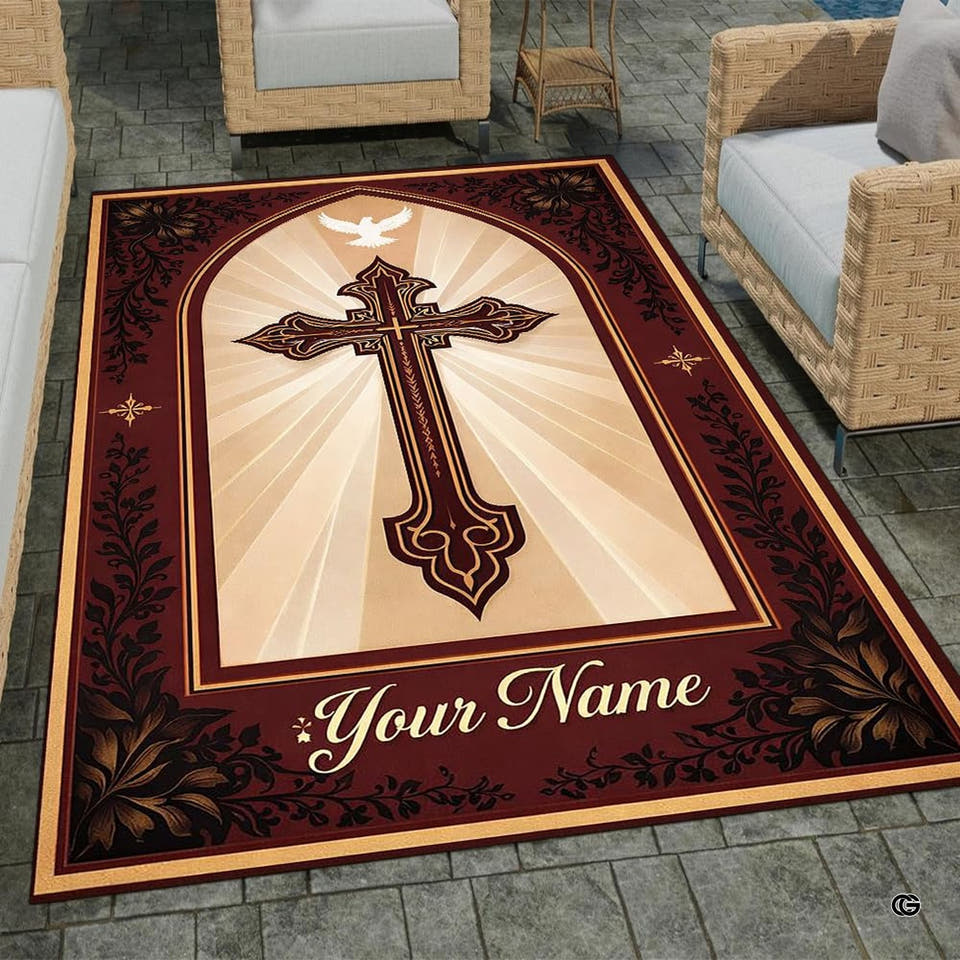 Christian cross rectangular area rug with arched cathedral window and dove placed in an outdoor patio seating area.