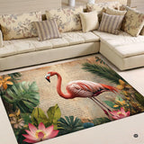 Vintage botanical script pink flamingo living room area rug in front of a sectional couch