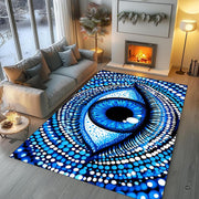 Living room seating arrangement with roaring fireplace and dotted evil eye rug on light hardwood - thumbnail image 5 of 8